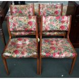 A set of four mid-century kitchen chairs upholstered in floral fabric