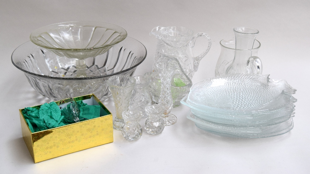 A quantity of cut glassware including a set of sideplates shaped as fish, two jugs, a cake stand,