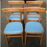 A set of four 1950s bentwood kitchen chairs with duck egg blue vinyl seats