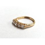 A 5 stone old cut diamond 18ct gold Victorian carved half hoop ring, finger size O,