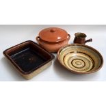 A box of ceramics including a large rectangular casserole, round casserole, handled pot,