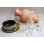 Clay amphora, cut glass decanters and glasses,