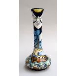 A narrow Moorcroft pottery vase,