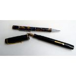Mentmore Osmi Iridium fountain pen with 14ct gold nib in black together with an Art Deco propelling