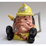 A Staffordshire 'Grumpy Gang Fireman' hand painted teapot,