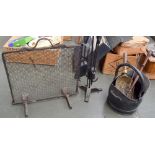 A small coal scuttle with brass coal shovel with turned wooden handle, a toasting fork, a poker,