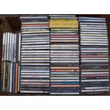 A mixed box of CDs to include music from the 1960s, 70s and 80s to include The Monkees,