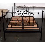 A metal framed double bed