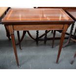 A fine mahogany gaming table, the hinged top opening to green baize, inlayed with satinwood,