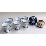 A box of Chinese ceramics, including 6 stem cups, 2 vases, ginger jar,