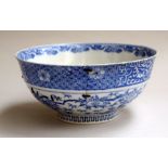 A blue and white oriental bowl, four characters to base,