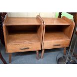 A pair of mid-century oak bedside tables, each with shelf and drawer, 59.