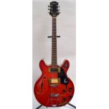 A 1960s Epiphone EA-250 electric guitar with modified tuning heads,