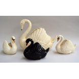 A large Dartmouth Devon Swan planter and three smaller Dartmouth Devon Swan planters,