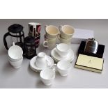 A set of seven white teacups and saucers, assorted mugs, a cafetiere, and a pewter hip flask,