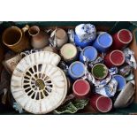 A box of ceramics including an ammonite plate, farmhouse cider jug by Wilson, 1937 Coronation mug,