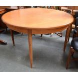 A mid-century G Plan extending dining table,