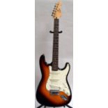 An Encore Stratocaster electric guitar, sunburst,