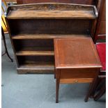 A small wooden book case and mahogany occasional table