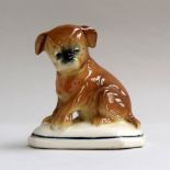 A continental figurine of a dog, 10.