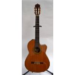 A Yamaha CGX-171CC electro-nylon guitar with mic in excellent condition,