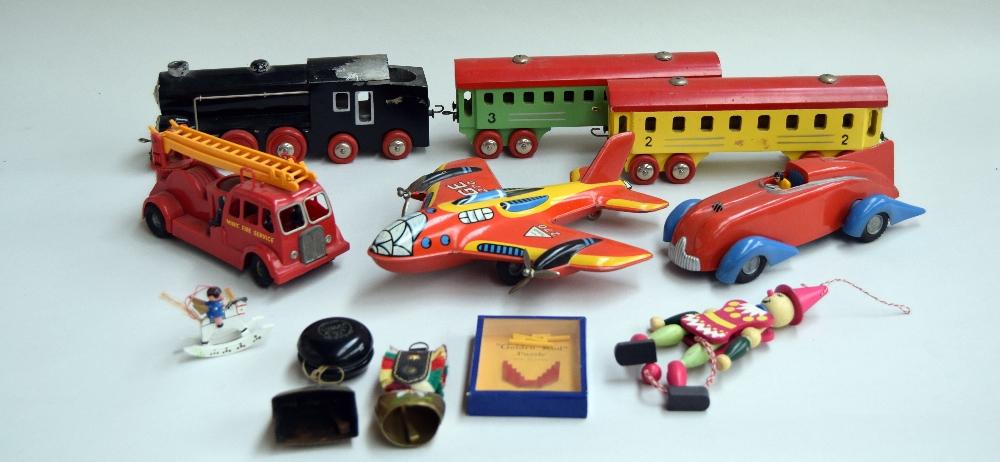 A quantity of vintage toys including a tin plate Technofix Rocket Plane GE 270,