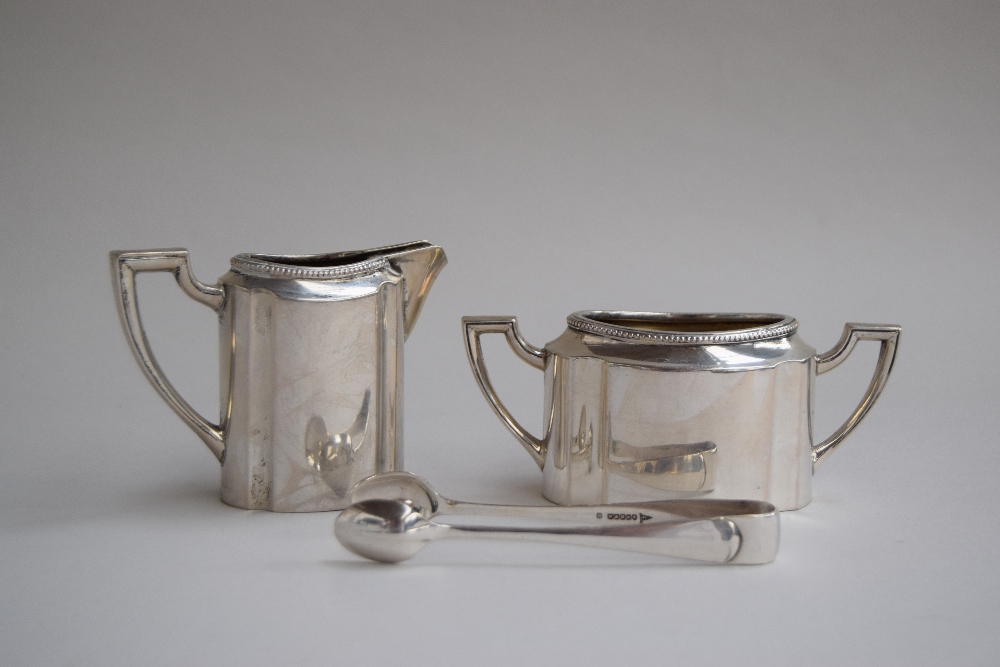 A continental silver sugar pot and milk jug, 6.