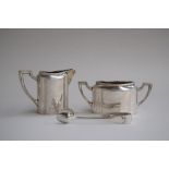 A continental silver sugar pot and milk jug, 6.