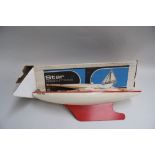 A vintage red scale model "Star" Sailing Yacht with masts,