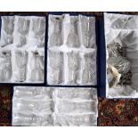 A quantity of boxed Taille Main lead crystal glasses, comprising six champagne flutes,