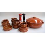 A mixed lot of terrcaotta items, including six small dishes, five wide ramekins,