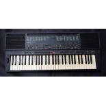 A Yamaha PSR-400 electric keyboard