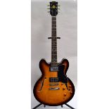 A Tokai ES-335 style hollow body electric guitar,