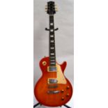 An Epiphone Les Paul Standard cherry sunburst electric guitar,