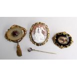 A Victorian Pinchbeck Framed large Shell Cameo Brooch of a classical scene,