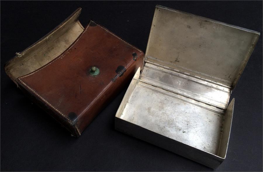 A metal sandwich box marked Brooks Bros N.Y, made in England, in a leather case stamped Swayne and - Image 2 of 2