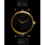 A GUCCI GOLD PLATED QUARTZ WATCH Movement: Quartz Case: Gold Plated Strap: Leather