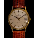 A GENTLEMAN’S 9CT GOLD OMEGA GENÉVE WRIST WATCH WITH DATE CIRCA 1974 with HALLMARK, DIAL SIGNED