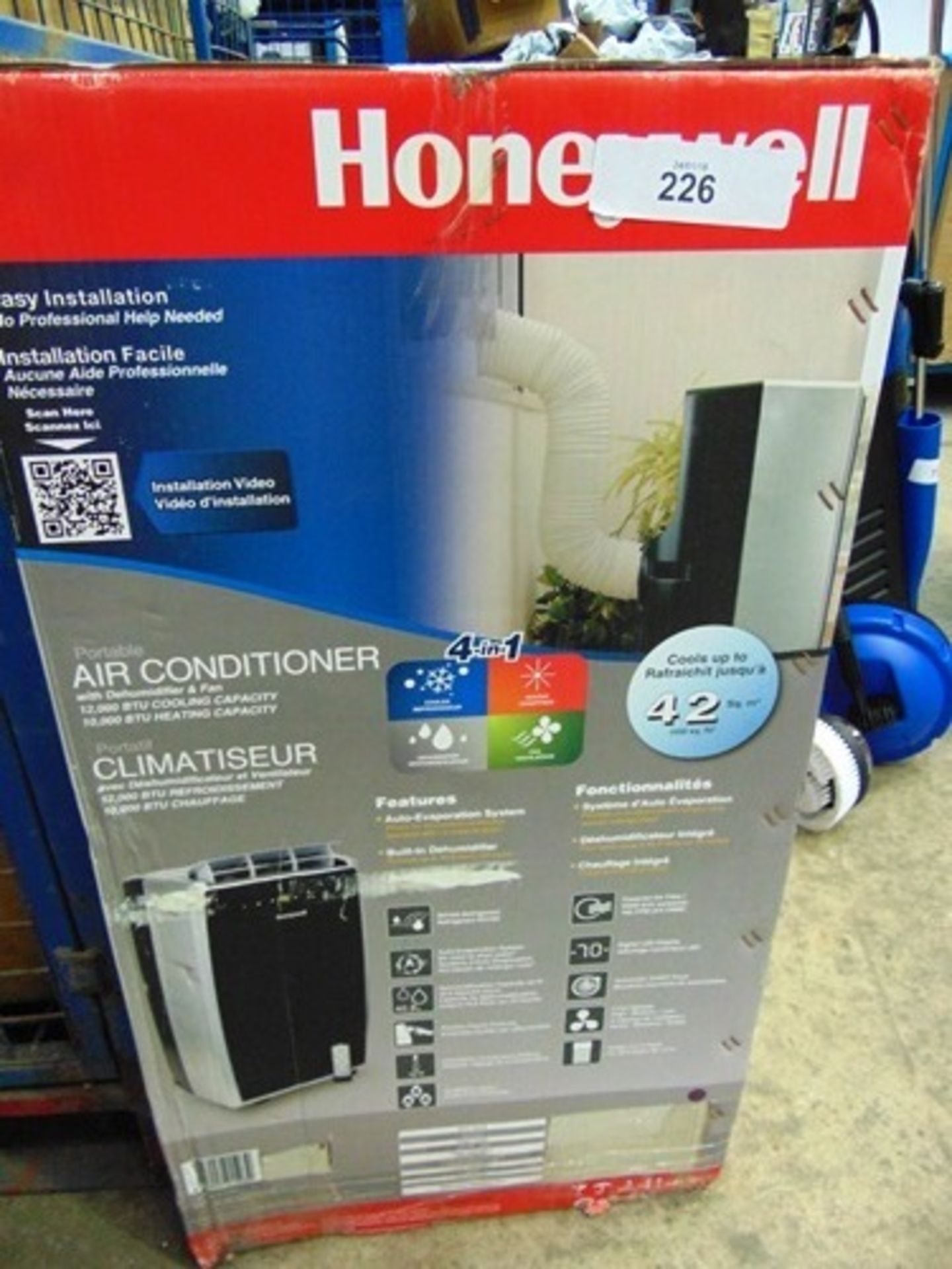 An Honeywell 4-in-1 portable air conditioning unit, model MN12CHES - Sealed new in box (ESC2Floor)