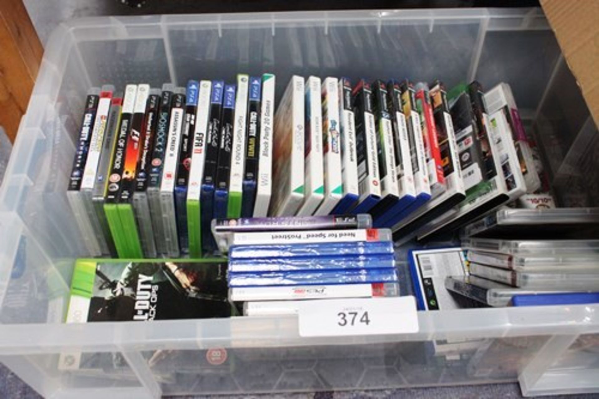 A crate of used games, including Xbox, Play Station and Wii - Used (CT1)