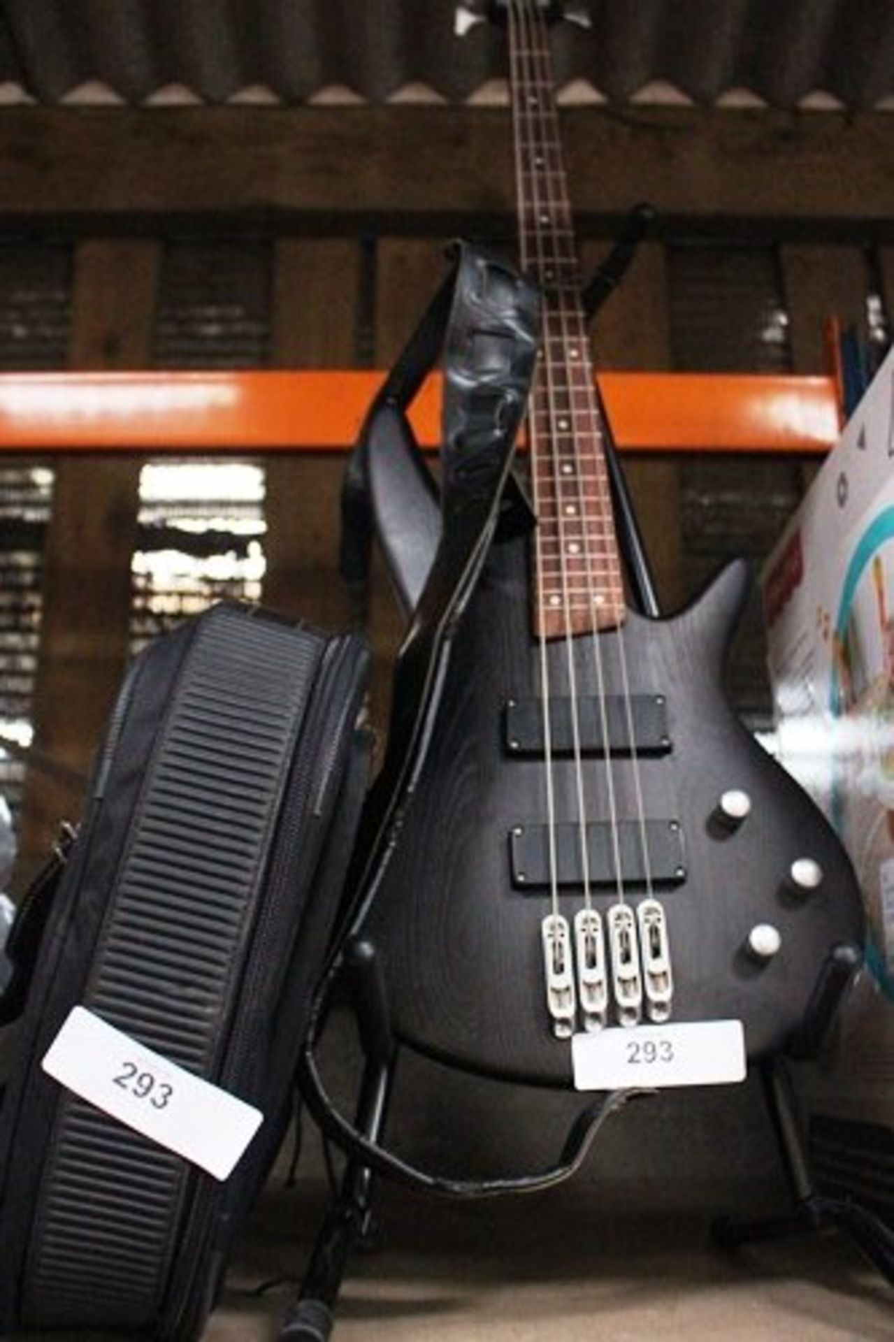 A Sanshi black and brushed aluminium bass guitar - Used, in good condition 1 small mark on neck,