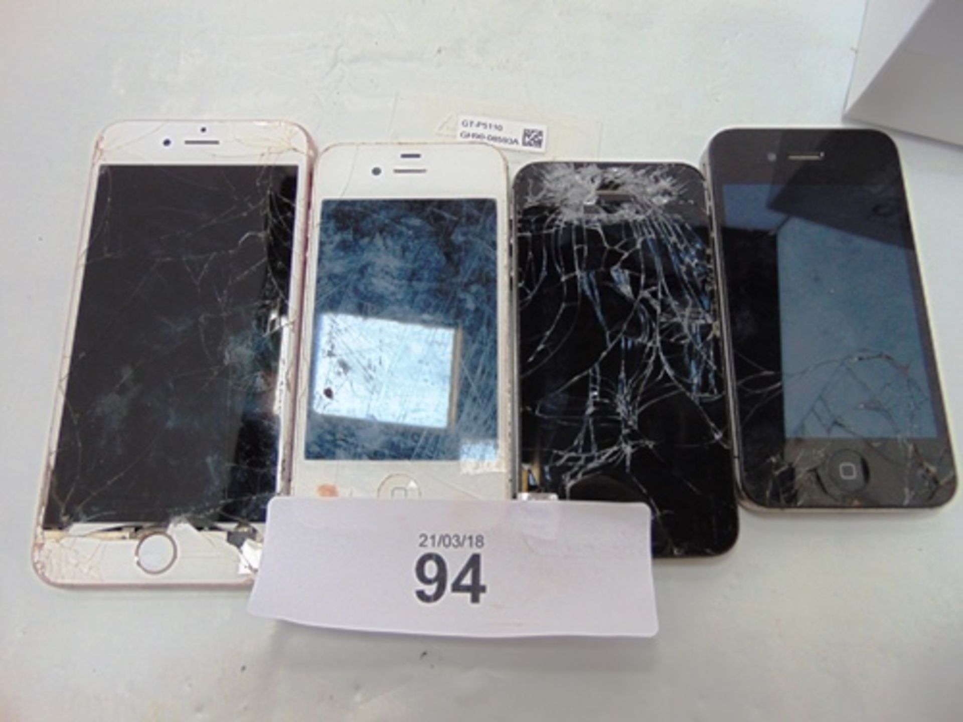 A lot of 4 Apple phones comprising 3 x iPhone 4S and 1 x iPhone 6, all have damaged screens and