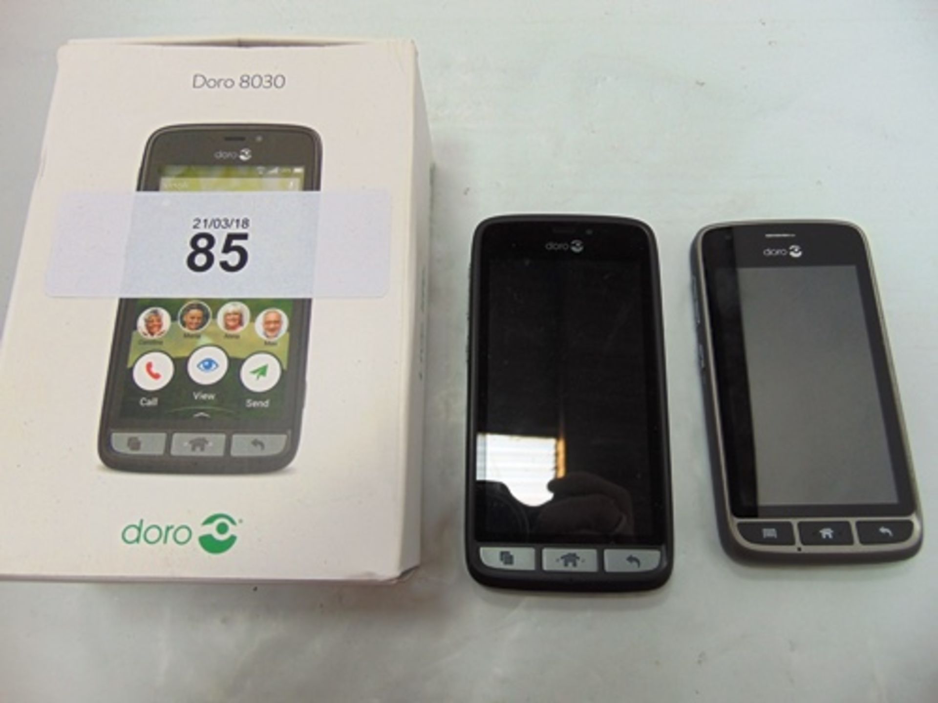 A Doro 8030 smartphone, model DSB-0018, colour black/steel, powers on, factory reset, IMEI: