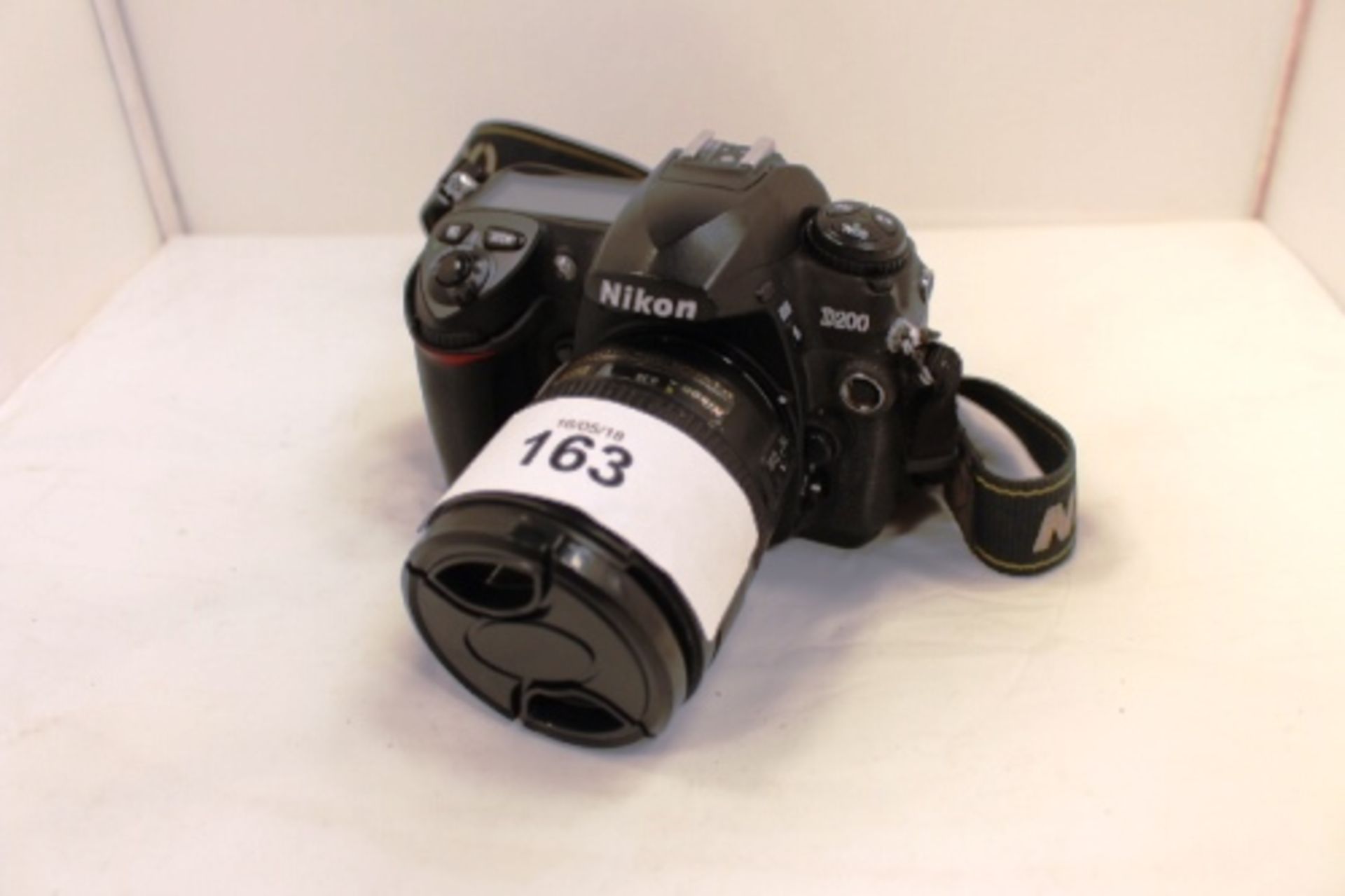 A Nikon D200 digital camera, no battery, untested, last serviced on 29/06/17, with 18-70mm lens,