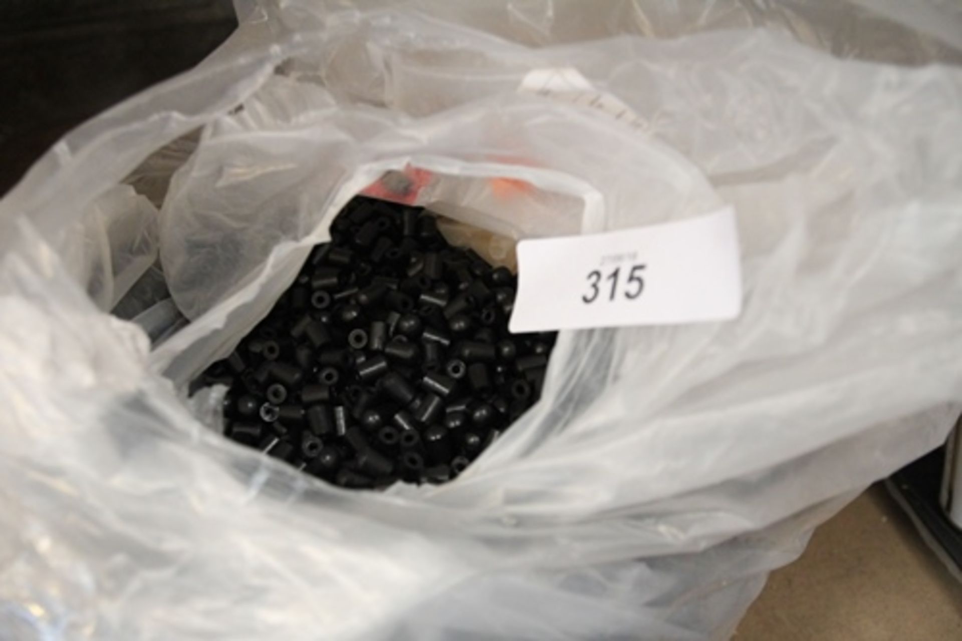 A bag of approximately 10,000 tapered ferrule black rubber feet 5/32inch - New (B30) - Image 2 of 2