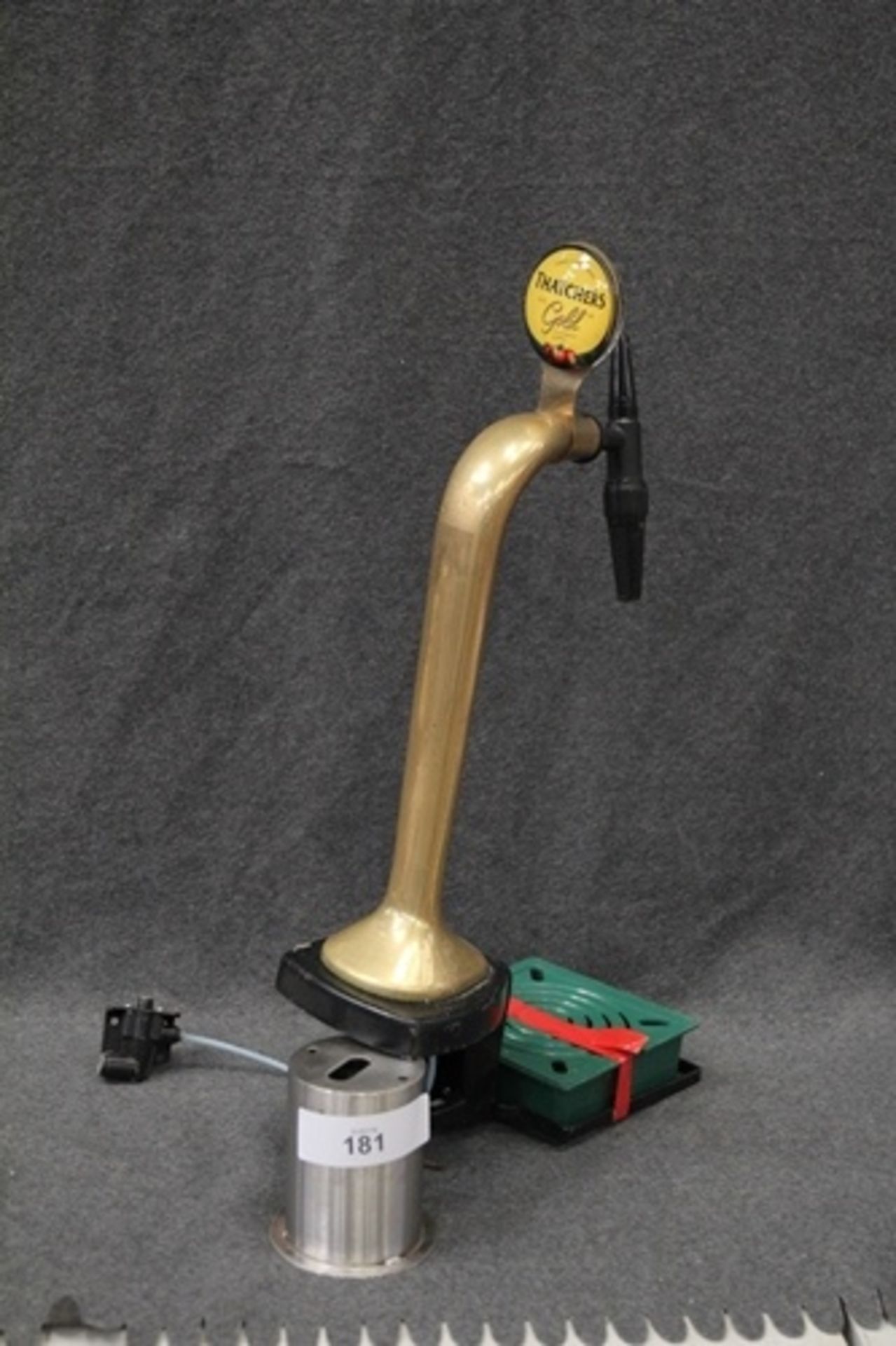 A modern brass single tap counter beer dispenser