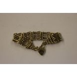 A 9ct gold gate link bracelet