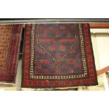 An approx. 44" x 77" Eastern red and blue patterne
