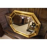 A gilt framed and bevelled edge mirror