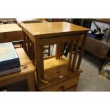 A set of three teak occasional tables